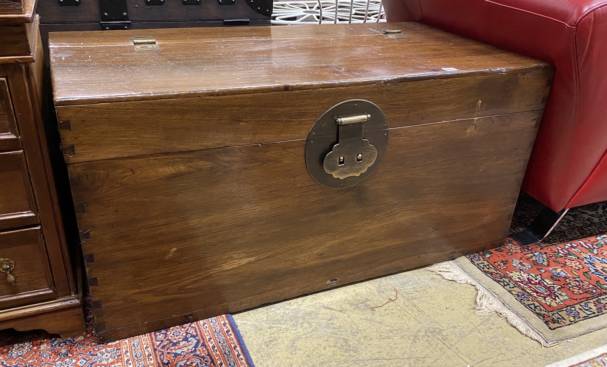 A Chinese brass mounted pine trunk, width 108cm, depth 56cm, height 53cm